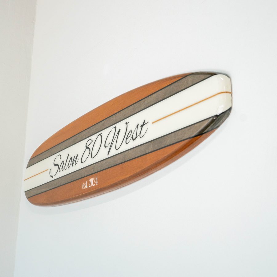 Custom Salon 80 West surfboard sign, established 2024